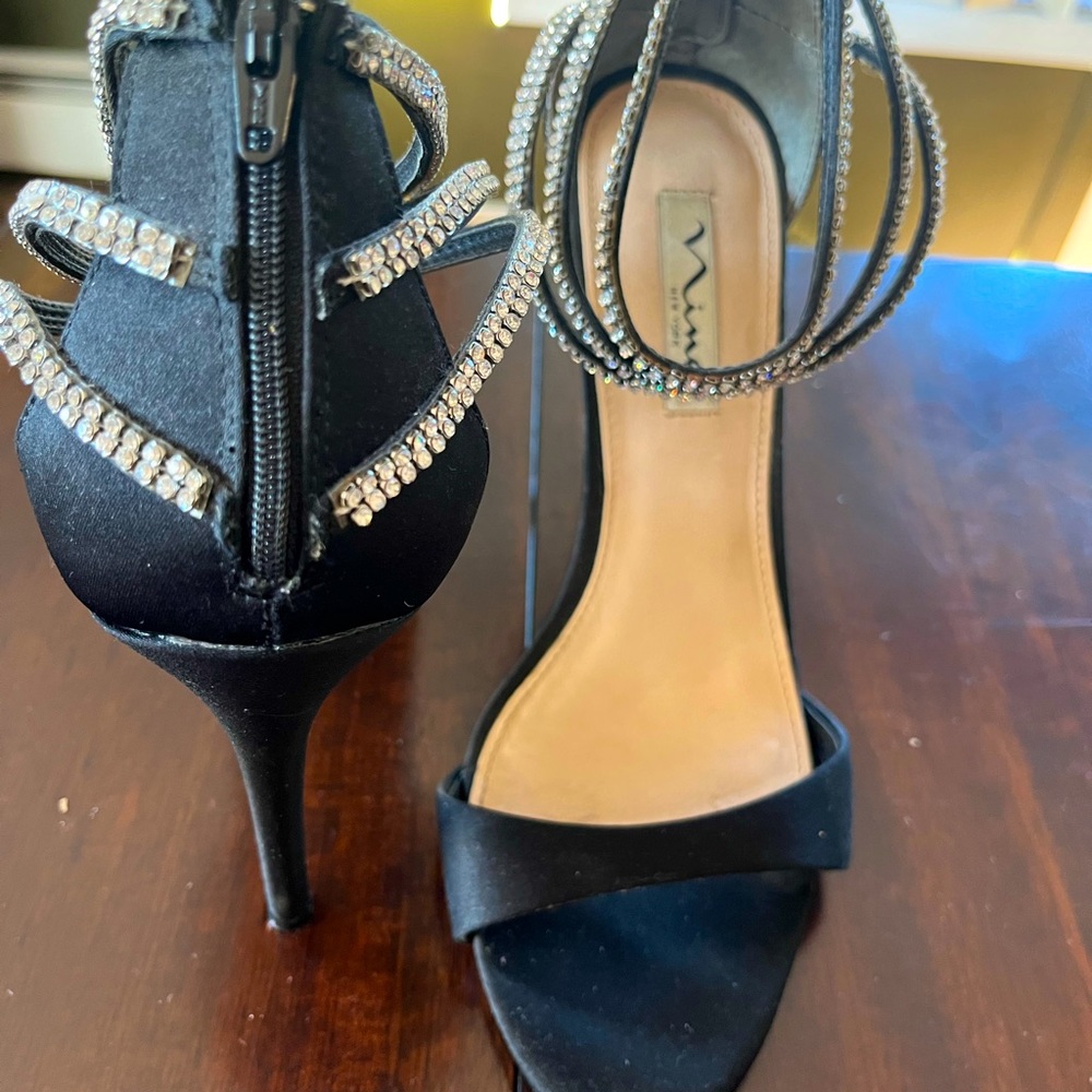 Nina, black studded, back zippered heals